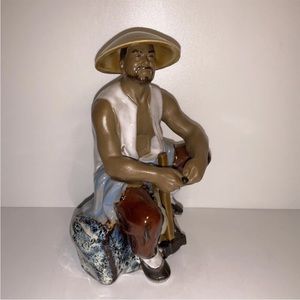 Vintage Man Wearing Hat, Seated With Hammer Glazed Mudware Figurine
